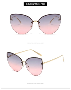 Detailed close-up of cat-eye sunglasses with gold metal temples and grey-pink gradient lenses