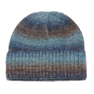 Detail of ribbed knit texture on a horizontal gradient blue and brown winter beanie hat