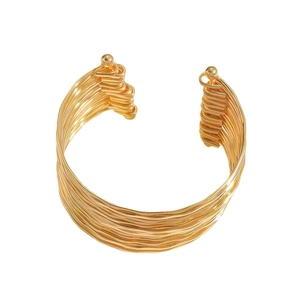 Layered wavy gold open cuff bracelet with spherical ends in a minimalist metallic style