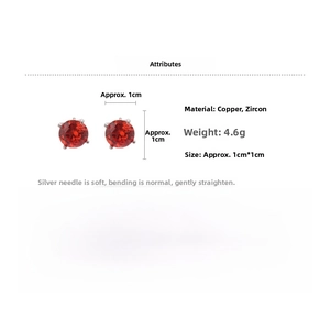 Detailed view of red cubic zirconia stud earrings with silver pins and claw setting