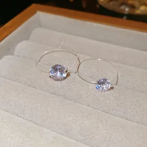 Elegant invisible string rings with sparkling round zircon stones for a floating effect
