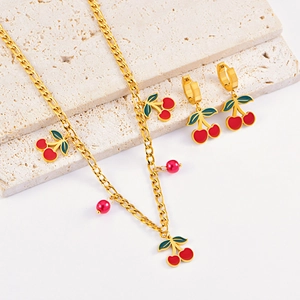 Gold stainless steel jewelry set with sweet red enamel cherries and green leaves
