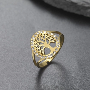 Macro shot of 18K gold tree of life hollow ring with sparkling zirconia micro-pave