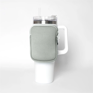 Close-up of a gray neoprene storage pouch with zipper attached to a 40oz white tumbler handle