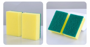 Detail of a double-sided kitchen sponge with green scouring pad and yellow foam layer