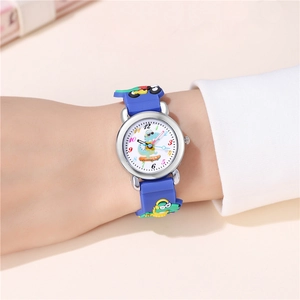 Close-up of kids' blue silicone watch featuring a cute dinosaur pattern on a child's wrist