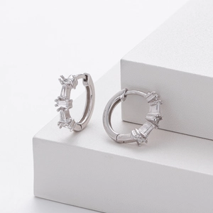 Detailed close-up of S925 silver hoop earrings featuring rectangular cubic zirconia stones