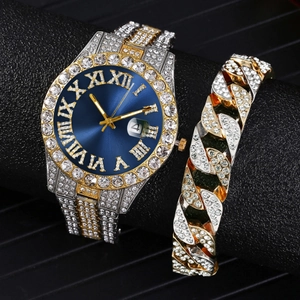 Close-up of luxury iced-out watch with blue dial and matching two-tone Cuban bracelet set