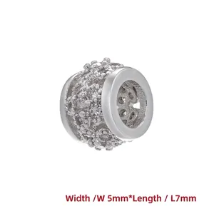 Macro shot of 7mm silver spacer bead with flower pattern and inlaid cubic zirconia