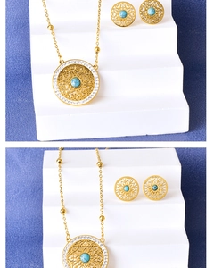 Detail view of turquoise jewelry set featuring hollow floral patterns and gold chain