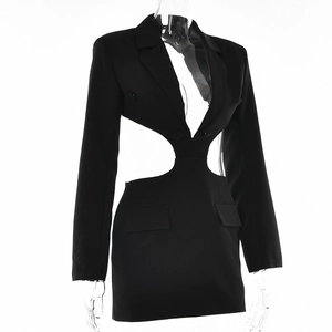 Detail of black long-sleeve blazer dress featuring waist cut-outs and flap pockets