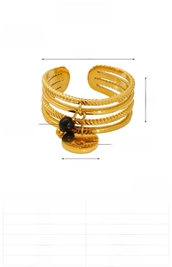 Detail of 18K gold-plated stainless steel multi-layer ring with black natural stone bead