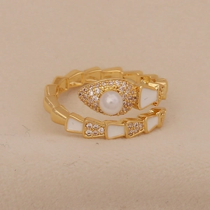 New Chinese vintage snake ring with white pearl and zircons on warm beige velvet