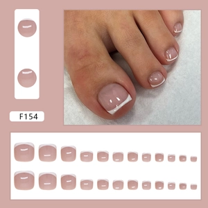Faux ongles d'orteils français rose nude avec bouts blancs, ensemble de 24 pièces variés