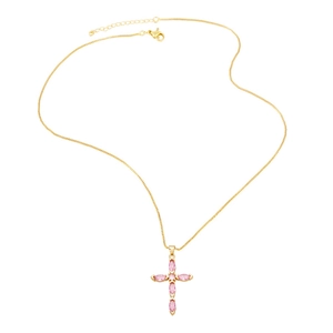 Detail of gold cross necklace featuring pink marquise-cut zircons on a white background