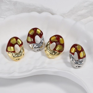 French vintage earrings in red and gold enamel on shell tray with stone texture