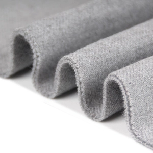 Classic men's minimalist grey winter scarf with thick wool blend fabric and tassel details