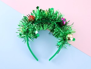 Detail of a Christmas tree headband with festive sequins and colorful shiny ornaments
