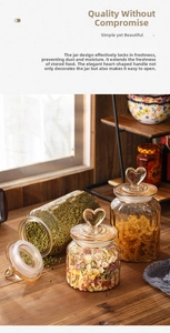 Detail of heart-shaped glass lid handle and vertical stripe relief texture on storage jars