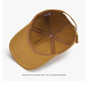 Detail view of cotton baseball cap interior showing sweatband and stitched seams