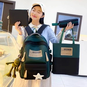 Fashionable dark green and black four-piece student backpack set with frog charm decoration