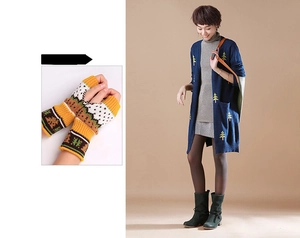 Detail of colorful knitted fingerless gloves with vintage pattern and warm winter texture