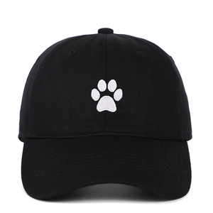 Classic black cotton baseball cap featuring white embroidered paw print on the front