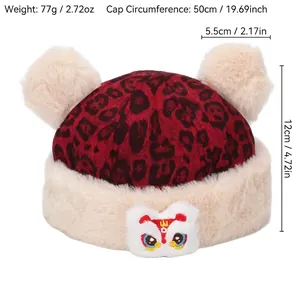 Winter leopard print kids hat with two fur pom poms and lion dance embroidery