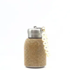300ml gold rhinestone insulated tumbler with silver lid and white pearl handle strap