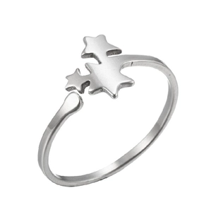 Detail of adjustable silver hollow ring featuring star motifs and a tree shape ornament