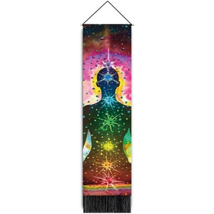 Detail of colorful meditation tapestry featuring seven chakra points and black tassels
