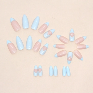 Almond-shaped press-on nails featuring light blue French tips and geometric patterns