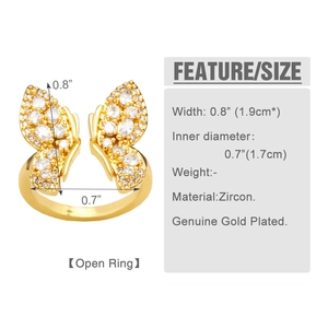 Detailed view of gold plated butterfly ring with white zircon inlays and dimensions