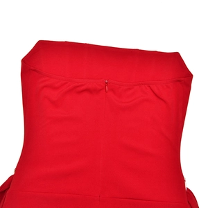 Detail view of the elegant red dress back featuring a seamless hidden zipper closure
