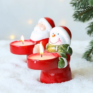 Christmas Santa and Snowman ceramic candle holder set on snow for holiday table decor