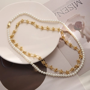 Collier double épaisseur en or hip-hop avec perles et design de nœud pour femmes