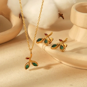 Parure bijoux vintage française en acier inoxydable avec motifs de feuilles vertes