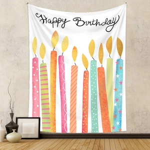 Detailed view of white Happy Birthday wall tapestry with colorful hand-drawn candles
