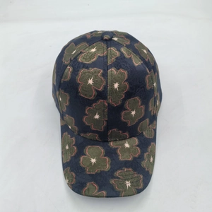 Outdoor sun protection baseball cap with dark floral print and structured brim