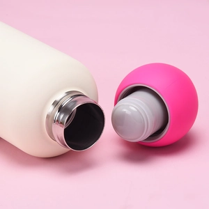 Detailed macro view of the 316 stainless steel bottle rim and rose pink sealing cap