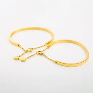 Minimalist 18K gold plated stainless steel C-shaped bracelets with heart pendants