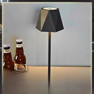 Detail of minimalist black sunset lamp with three-color dimming and matte metal finish