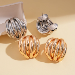 Minimalist geometric multilayer textured hoop earrings in polished gold and silver finish