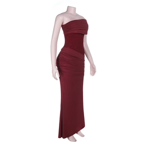Detail of the pleated bodice and sweetheart neckline on a burgundy evening gown