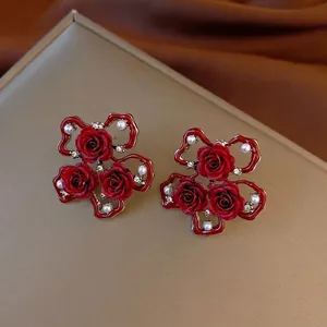 Vintage red rose earrings with pearls and crystals for a luxurious floral look