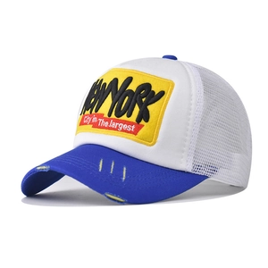 Detail of 3D embroidered NEW YORK patch on a vintage mesh trucker baseball cap