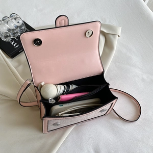 Pink and gray patterned crossbody bag with multiple interior compartments for women