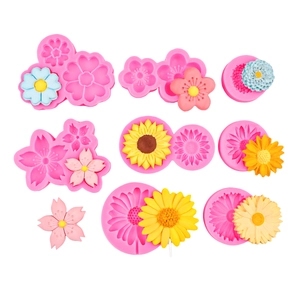 Detail of pink silicone flower molds for sunflower and cherry blossom clay crafting
