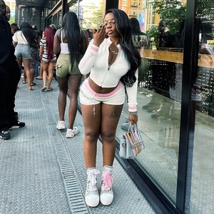 Detail of a two-piece white and pink striped zip-up hoodie and shorts set for women