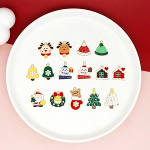 Detailed set of 13 colorful enamel Christmas charms including reindeer and santa claus